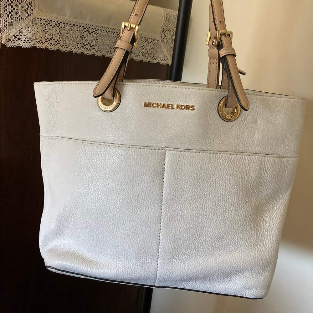 Michael Kors White Leather Tote with ivory handles.